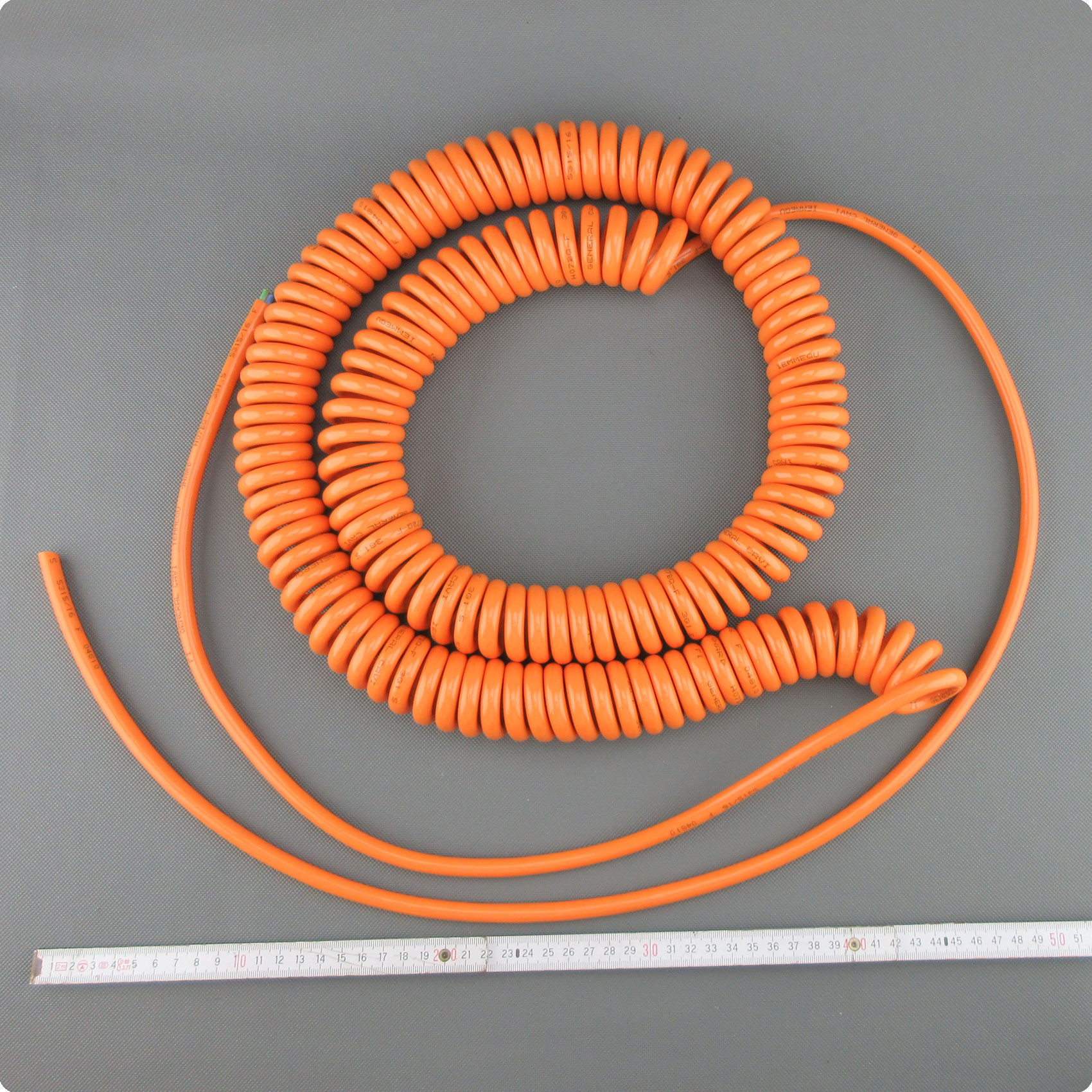 Cable PUR en espiral color naranja de 3x1,5 mm², CE, enrollado especial de gran diámetro de bloque en espiral